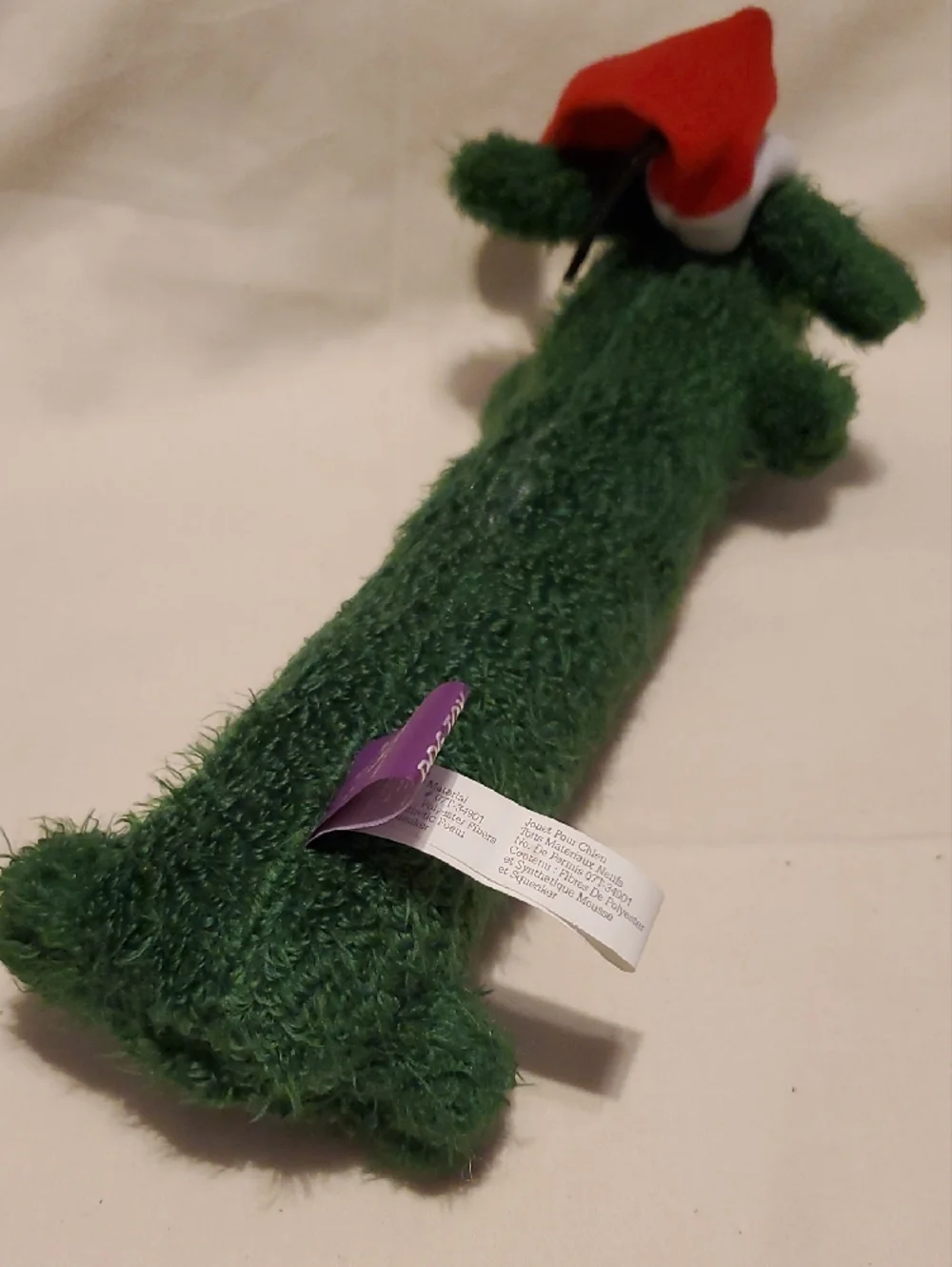 Green Loofa Dog Toy with Santa Hat
